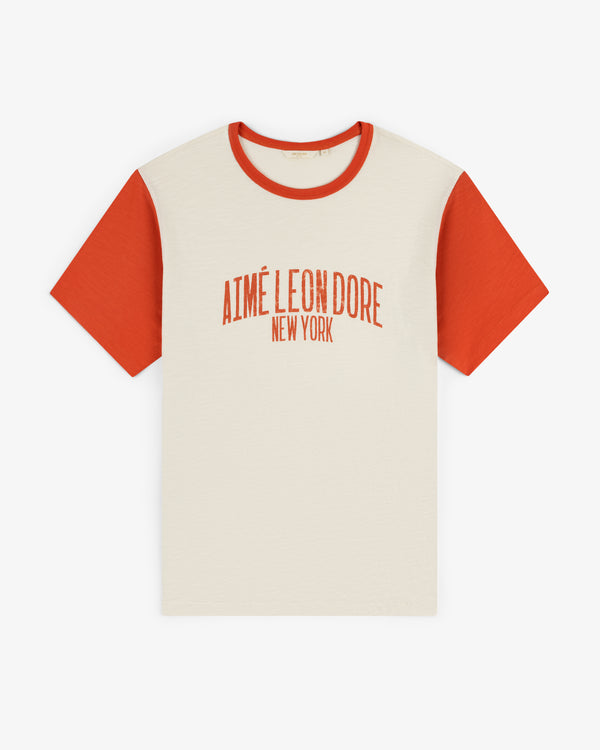 Washed Ringer Tee: cream with red sleeves, Aimé Leon Dore New York printed in red on the front.