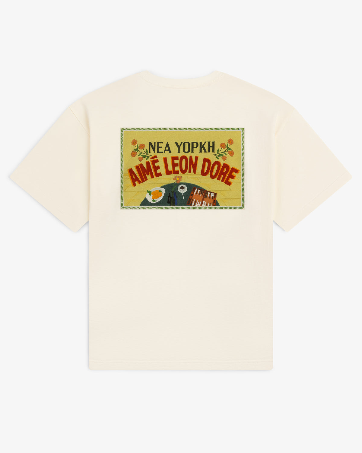 Aimé Postcard Tee in cream features a colorful rectangle graphic and NEA YOPKH AIME LEON DORE text on the back.