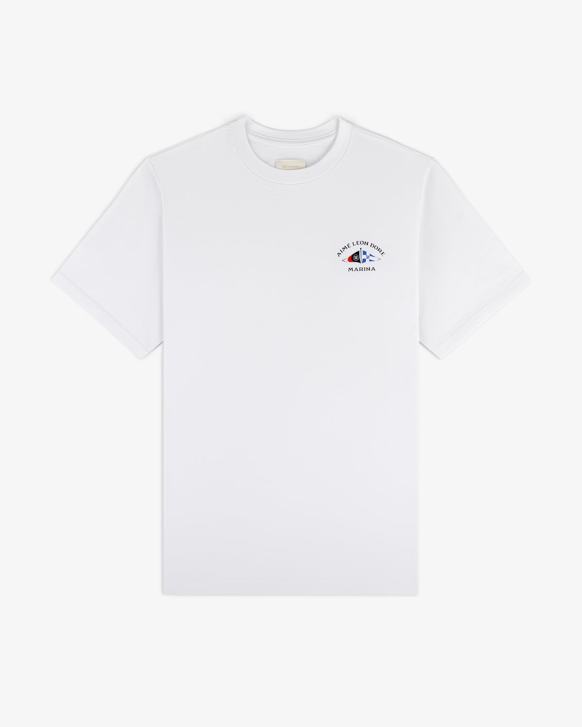Marina Tee: white short-sleeve with small blue and red graphic and text on upper left chest.