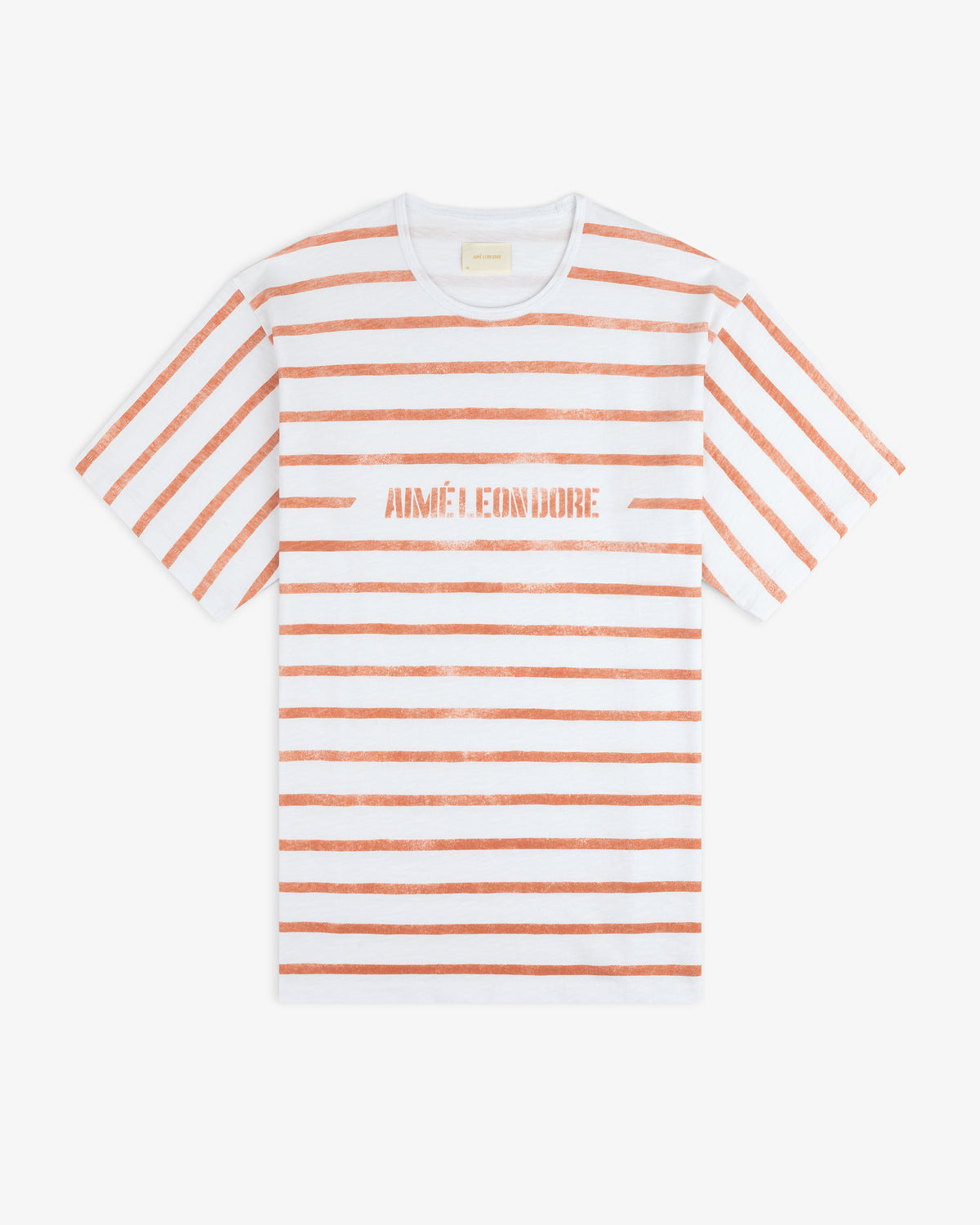 Slub Beach Tee: White with horizontal orange stripes and AIMÉ LEON DORE in orange text across the chest.