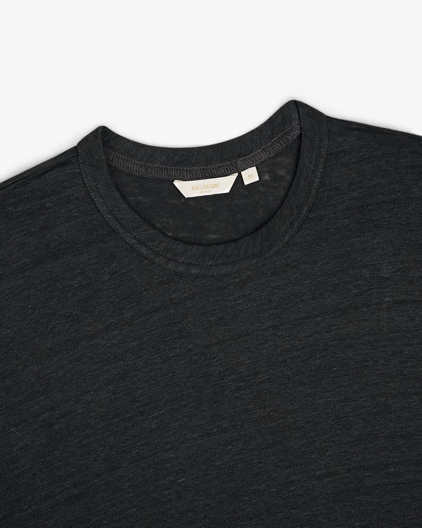 Linen Tee in dark gray, crew neck style, laid flat to display upper chest, collar, and inner neckline tag.
