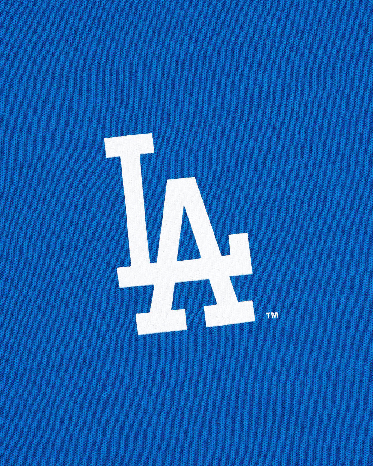 White LA logo on blue, ALD / LA Dodgers Unisphere Tee representing the Los Angeles Dodgers baseball team.