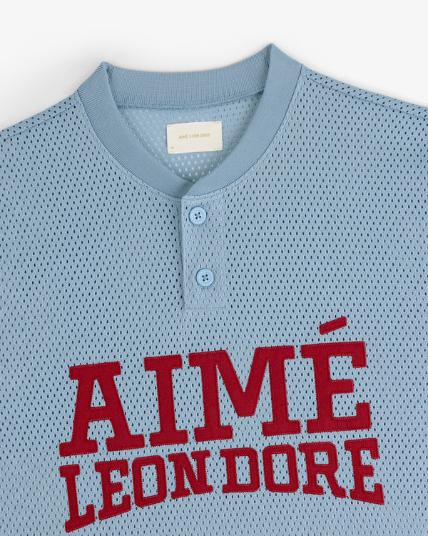 Light blue Mesh Batting Practice Jersey with two buttons and AIMÉ LEON DORE in large red letters on the chest.