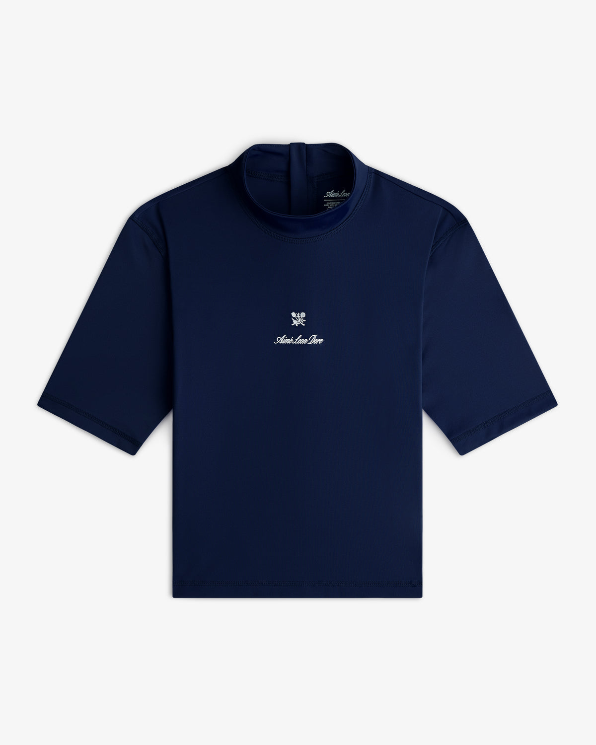 Short Sleeve Crest Rash Guard in navy, high collar, small white logo and text on chest, laid flat on white background.