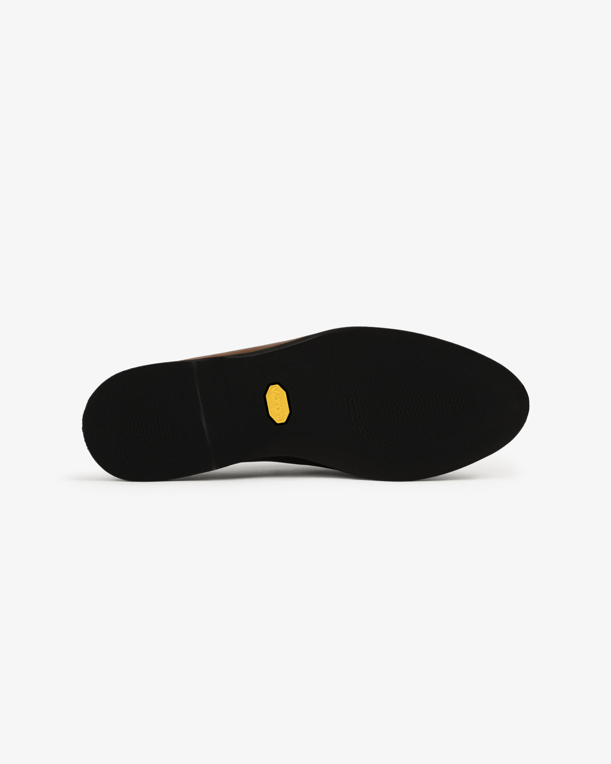 The Venetian Mule's black sole features a small yellow hexagonal logo at the center, viewed from below on white.