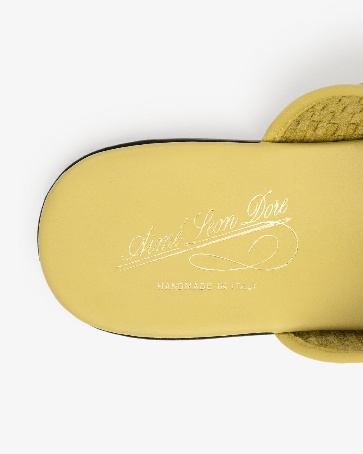 Yellow Leather Raffia Mule with Aimé Leon Dore and Handmade in Italy in white script on the insole.