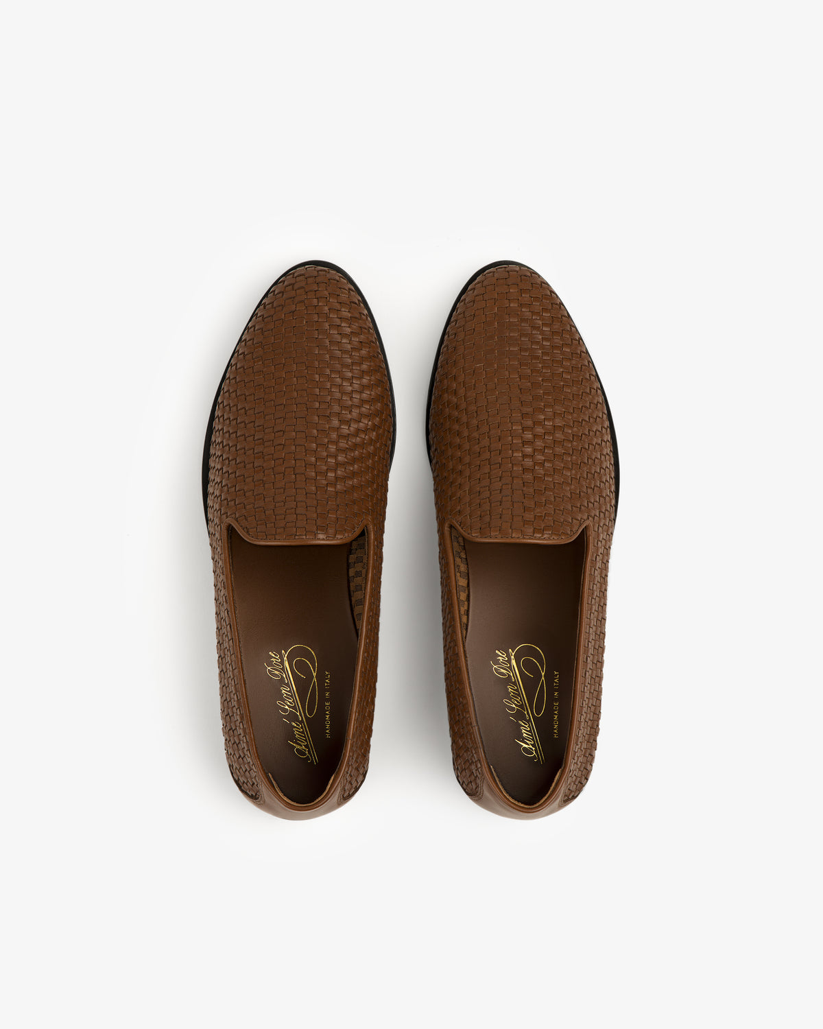 Leather Raffia Loafer in brown with a woven texture, shown from above on a white background.