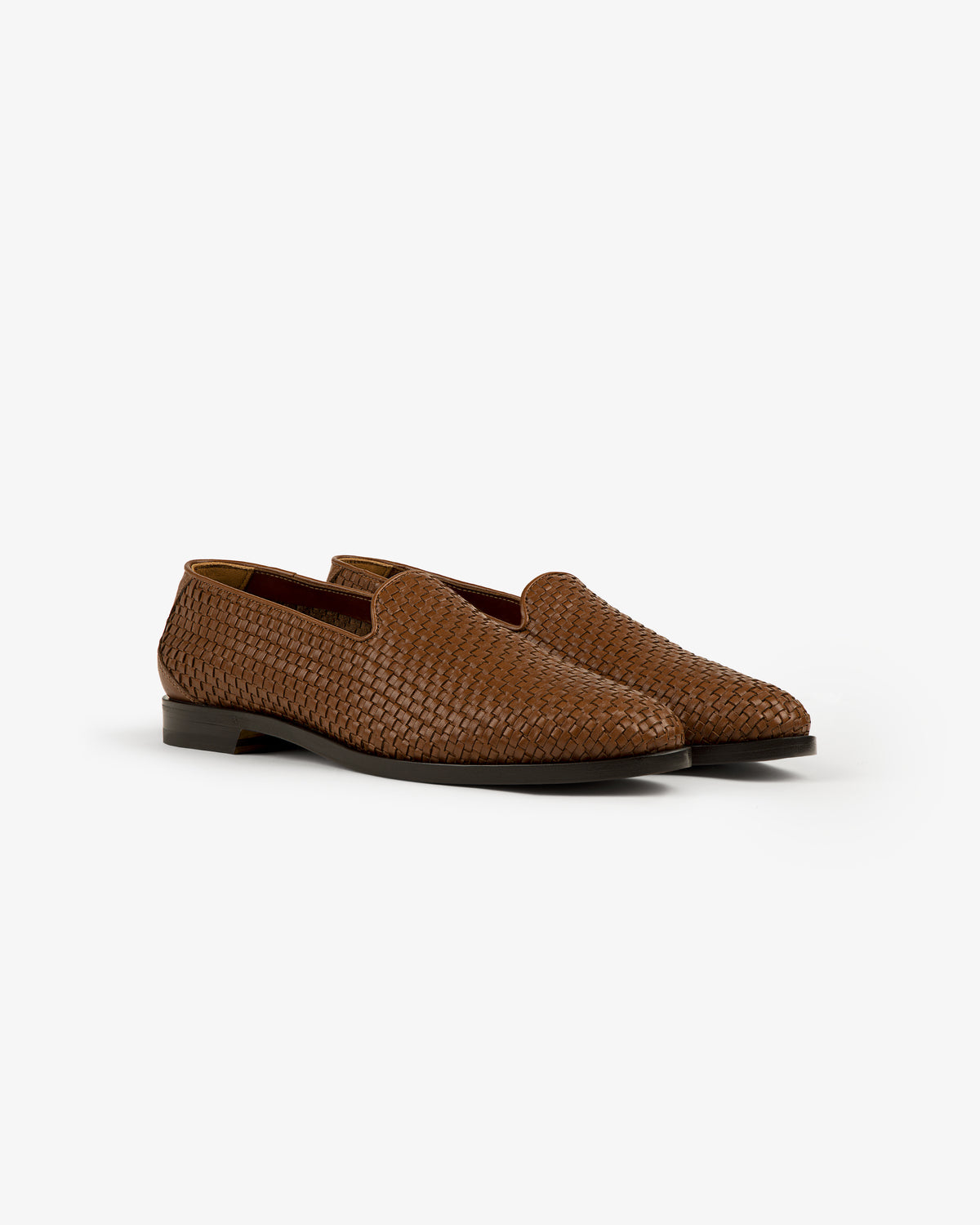 Leather Raffia Loafer in brown with low heels displayed against a plain white background.