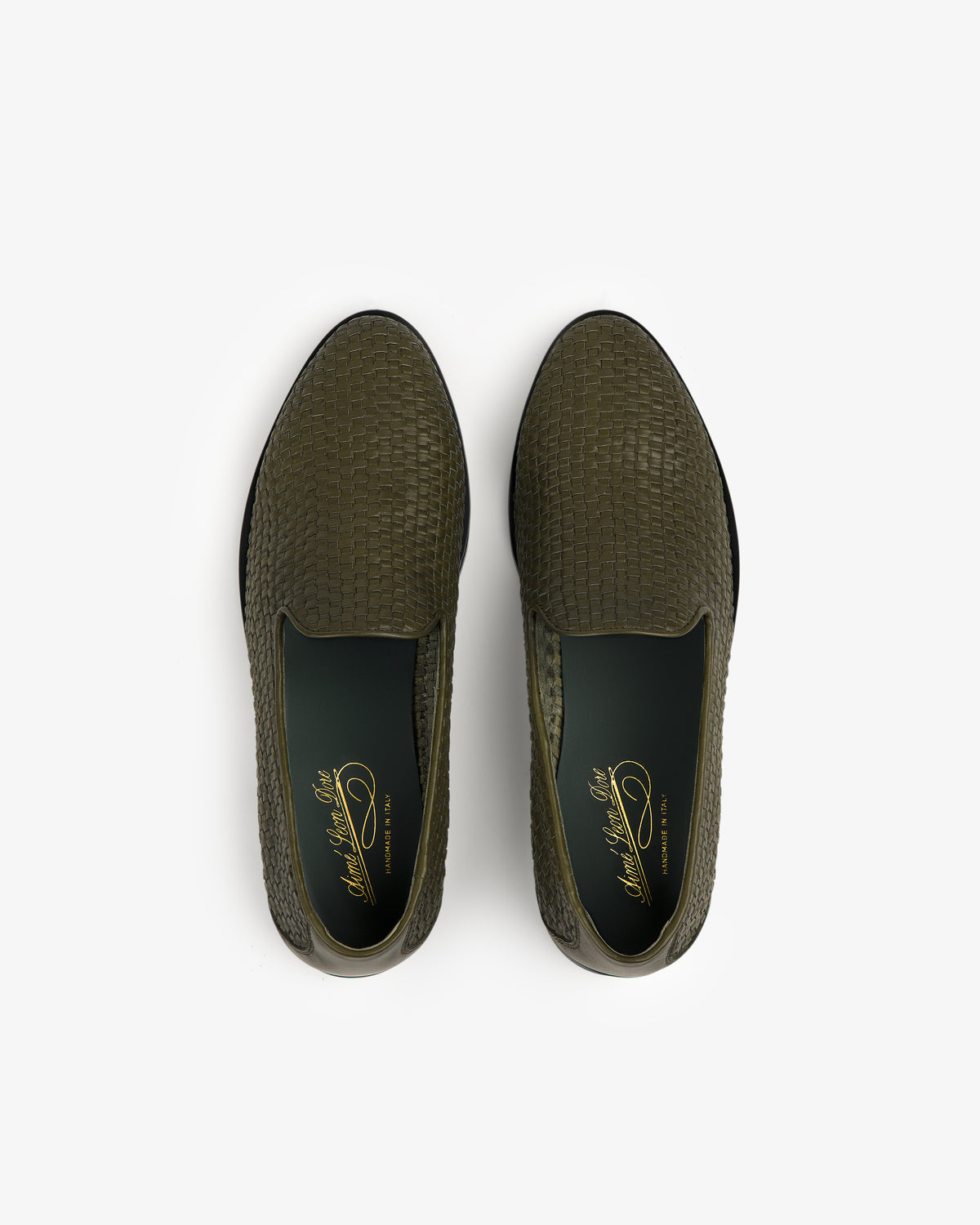 Top view of a pair of Leather Raffia Loafers in olive green with woven texture and dark green insoles.