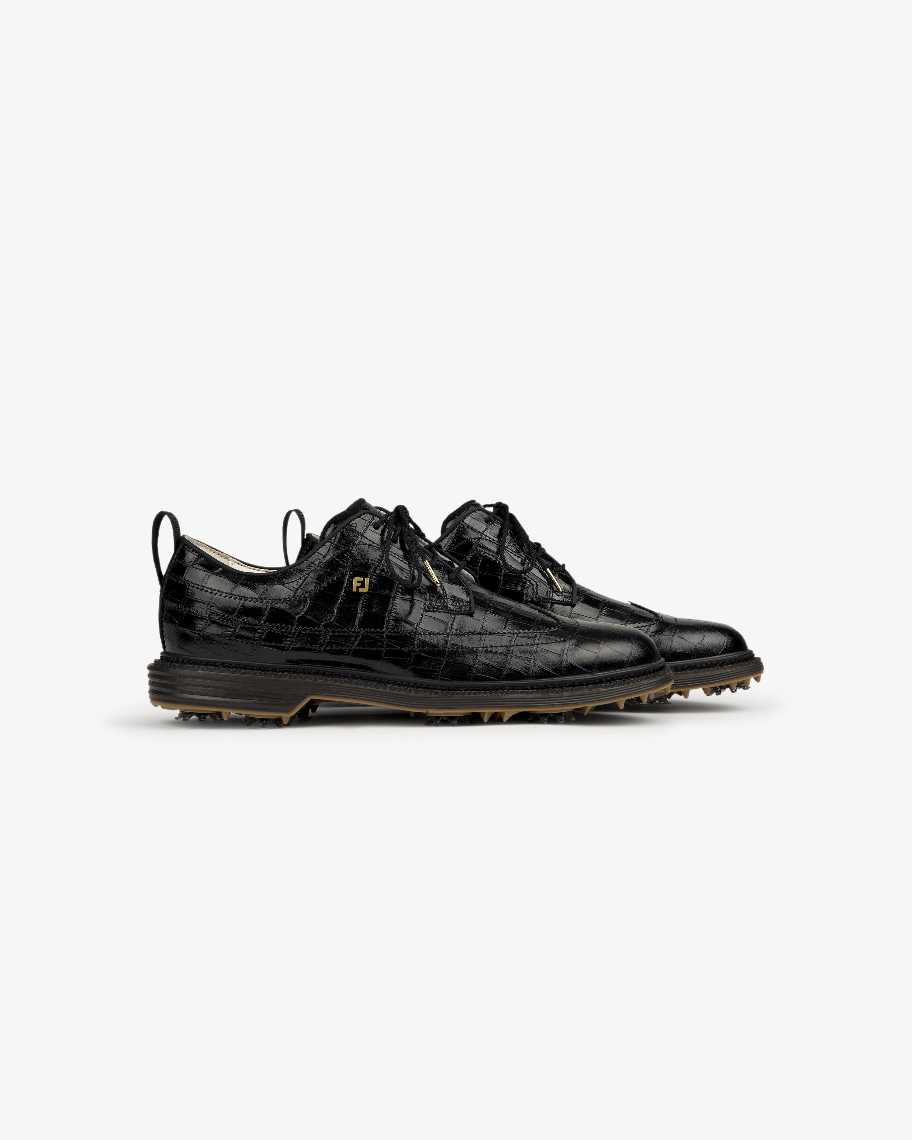 ALD / Footjoy Croc-Embossed Premiere Series Marquis black leather dress shoes with lace-up fronts and brown soles.