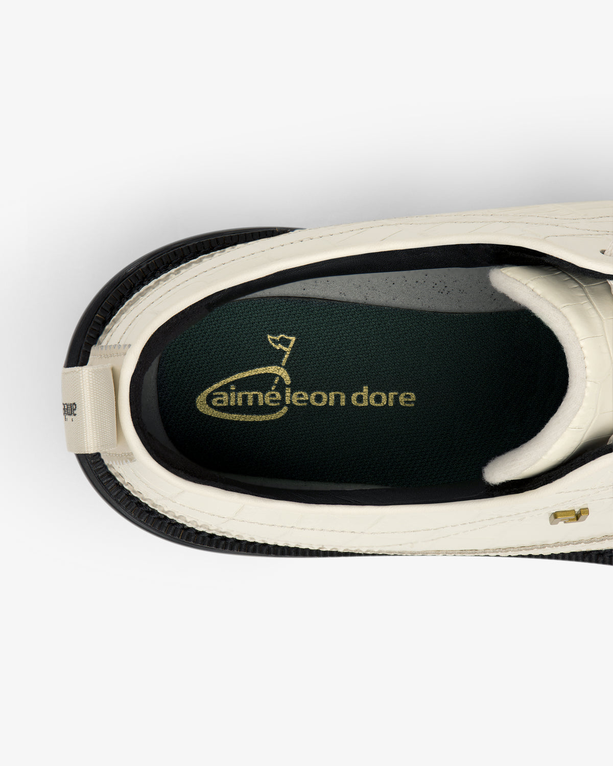 Top view of ALD / Footjoy Croc-Embossed Premiere Series Marquis with gold aimé leon dore on dark green insole.