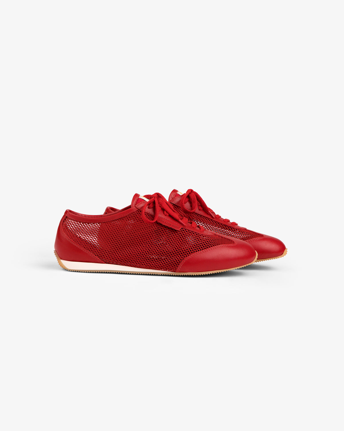 Low Profile Mesh Trainer: red mesh sneakers with red laces and beige rubber soles on a white background.