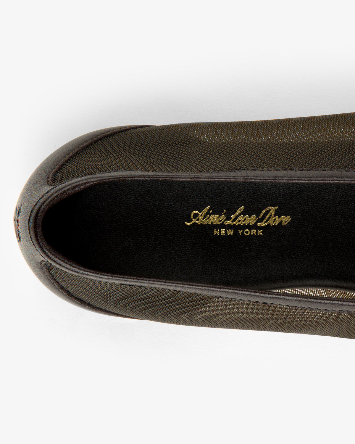 Top view of a Mesh Ballet Flat with Aimé Leon Dore NEW YORK gold branding on the black insole.