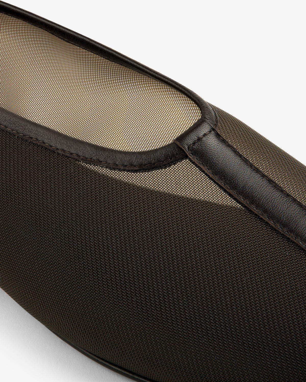 Close-up of a Mesh Ballet Flat's brown mesh and leather upper with fine stitching detail.