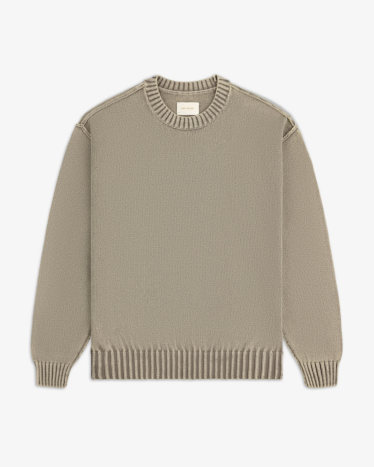 Washed Inside Out Sweater in beige with ribbed collar, cuffs, and hem, laid flat on a white background.