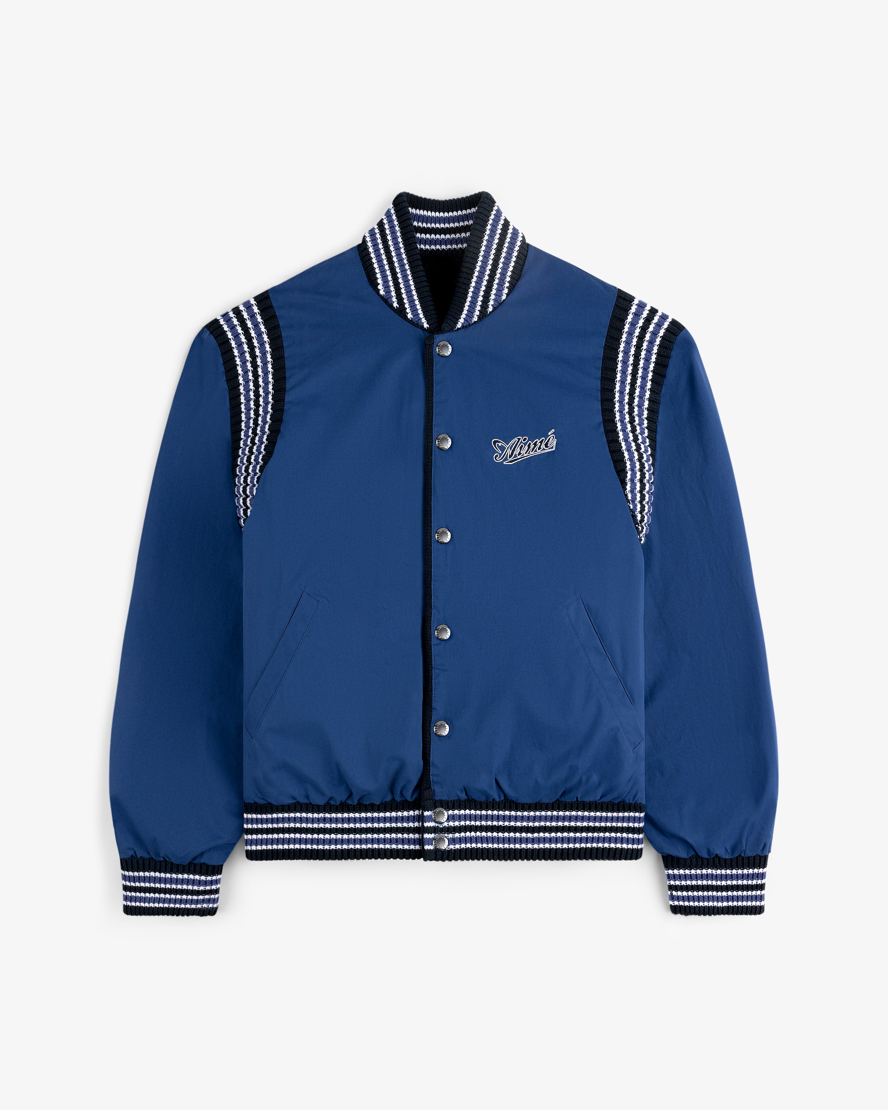 Reversible Knit Bomber Jacket in blue with black and white striped trim and "Saint" embroidered on the chest.