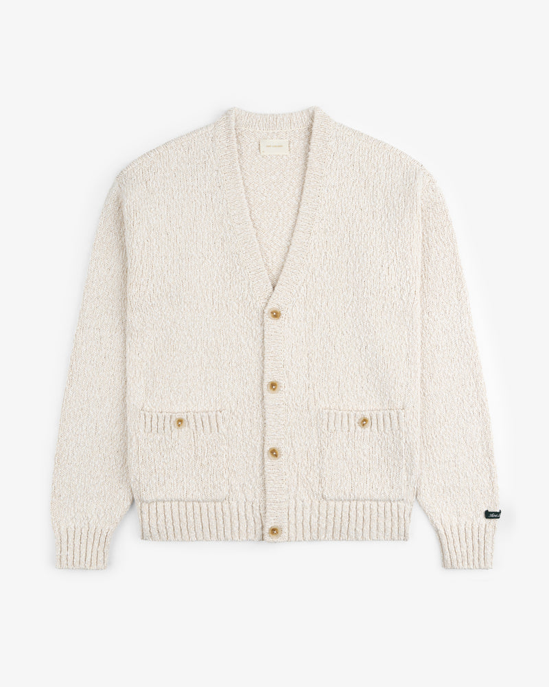 Cotton Slub Cardigan in cream with buttons, front pockets, ribbed cuffs and hem, laid flat on a white background.