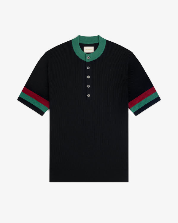 Sport Knit Henley: Black short-sleeve polo with green collar, button placket, and green-red striped sleeves.