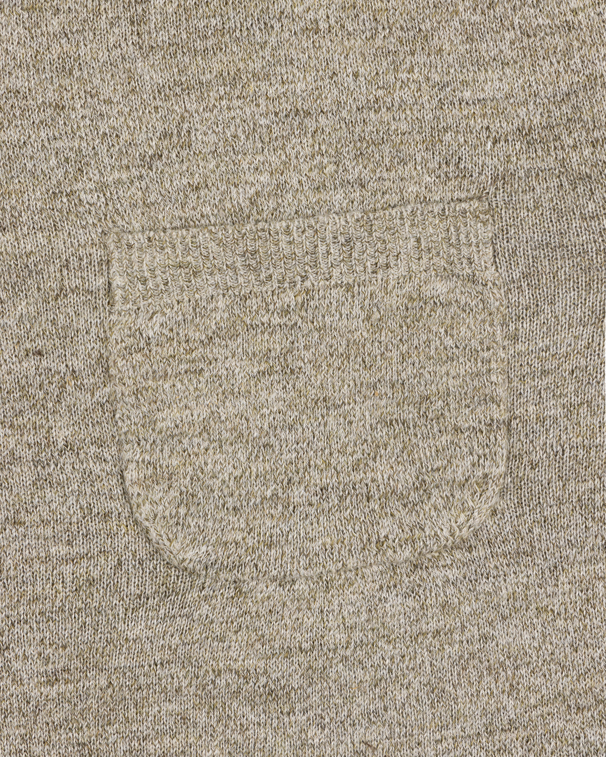 Close-up of a small sewn pocket on the Long-Sleeve Knit Pocket Tee, highlighting beige knit texture and stitching.