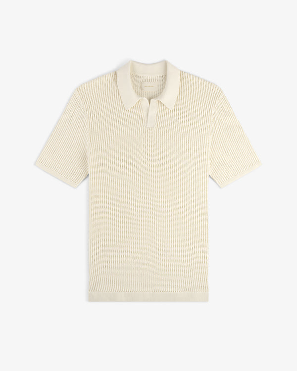 Cream-colored Mesh Knit Polo with short sleeves, textured pattern, and collar, laid flat on a white background.