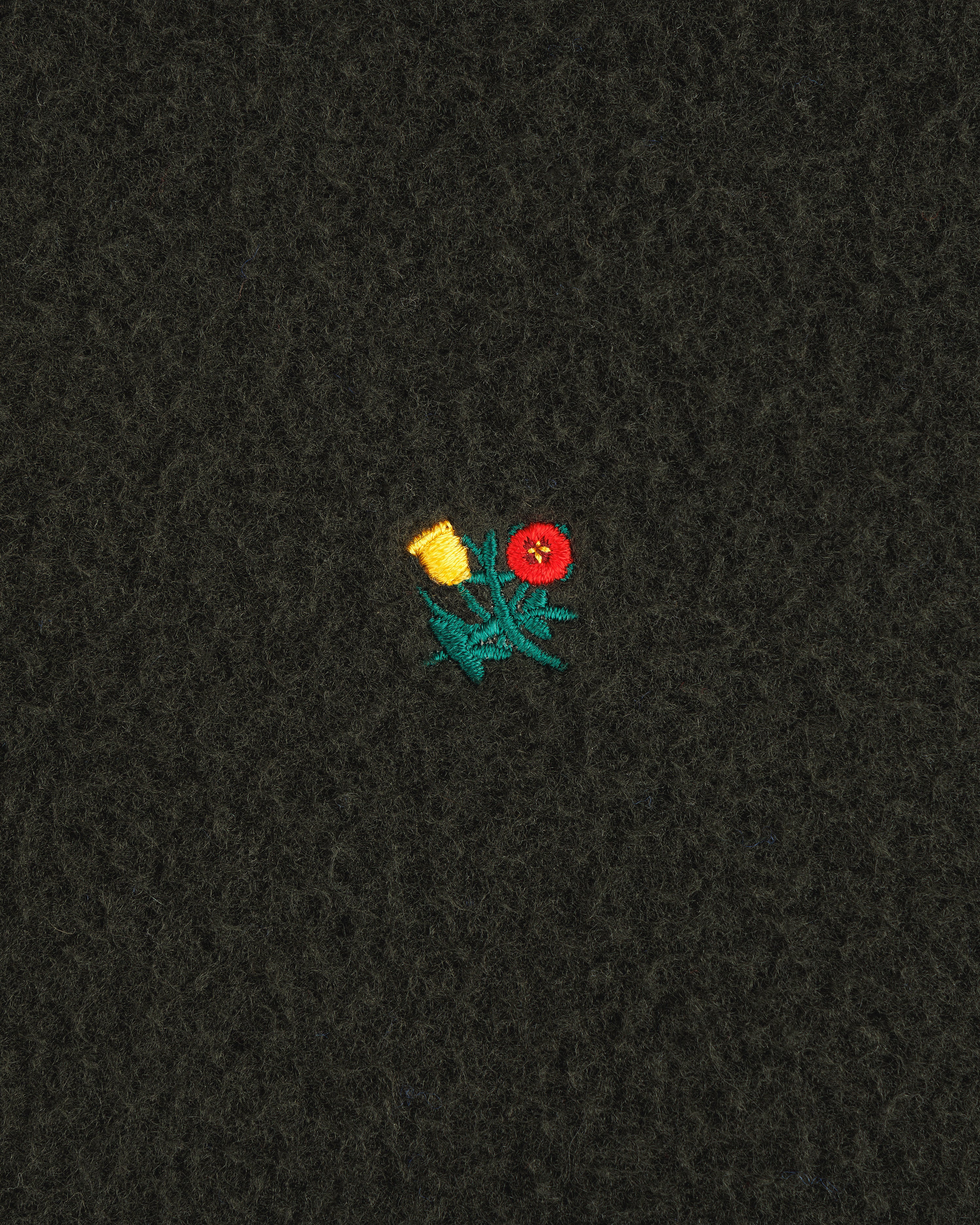 Small yellow and red embroidered flowers with green stems adorn the Casentino Crest Half-Zip Pullover.