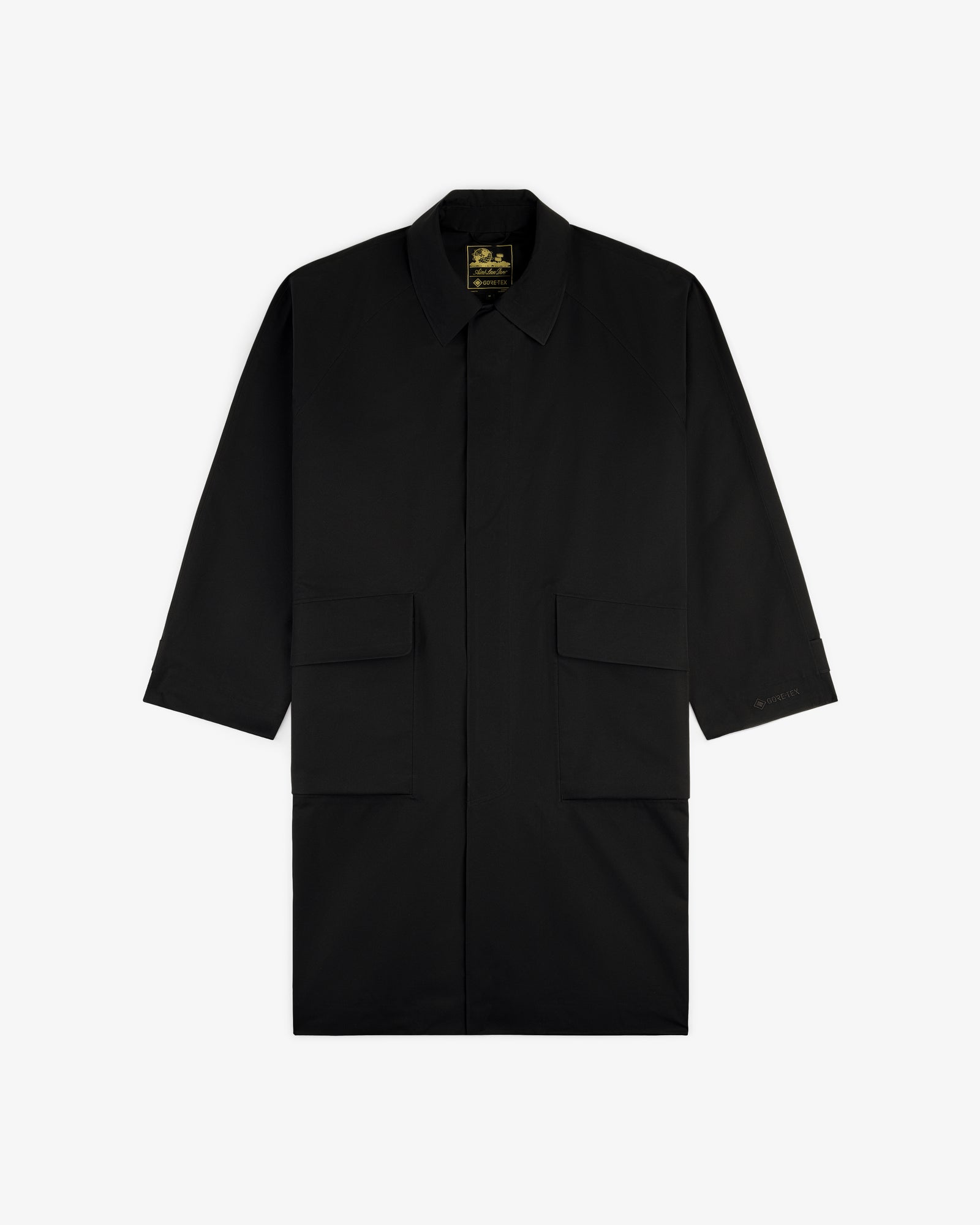 GORE-TEX Balmacaan Coat with a collar and two large front flap pockets, shown on a white background.