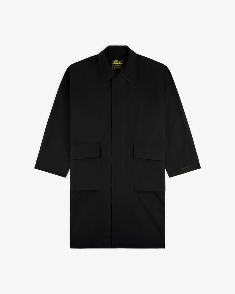 GORE-TEX Balmacaan Coat with a collar and two large front flap pockets, shown on a white background.