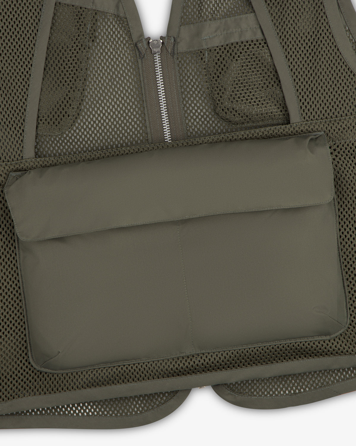 Close-up of the Nylon Utility Vest featuring a large rectangular padded front pocket.