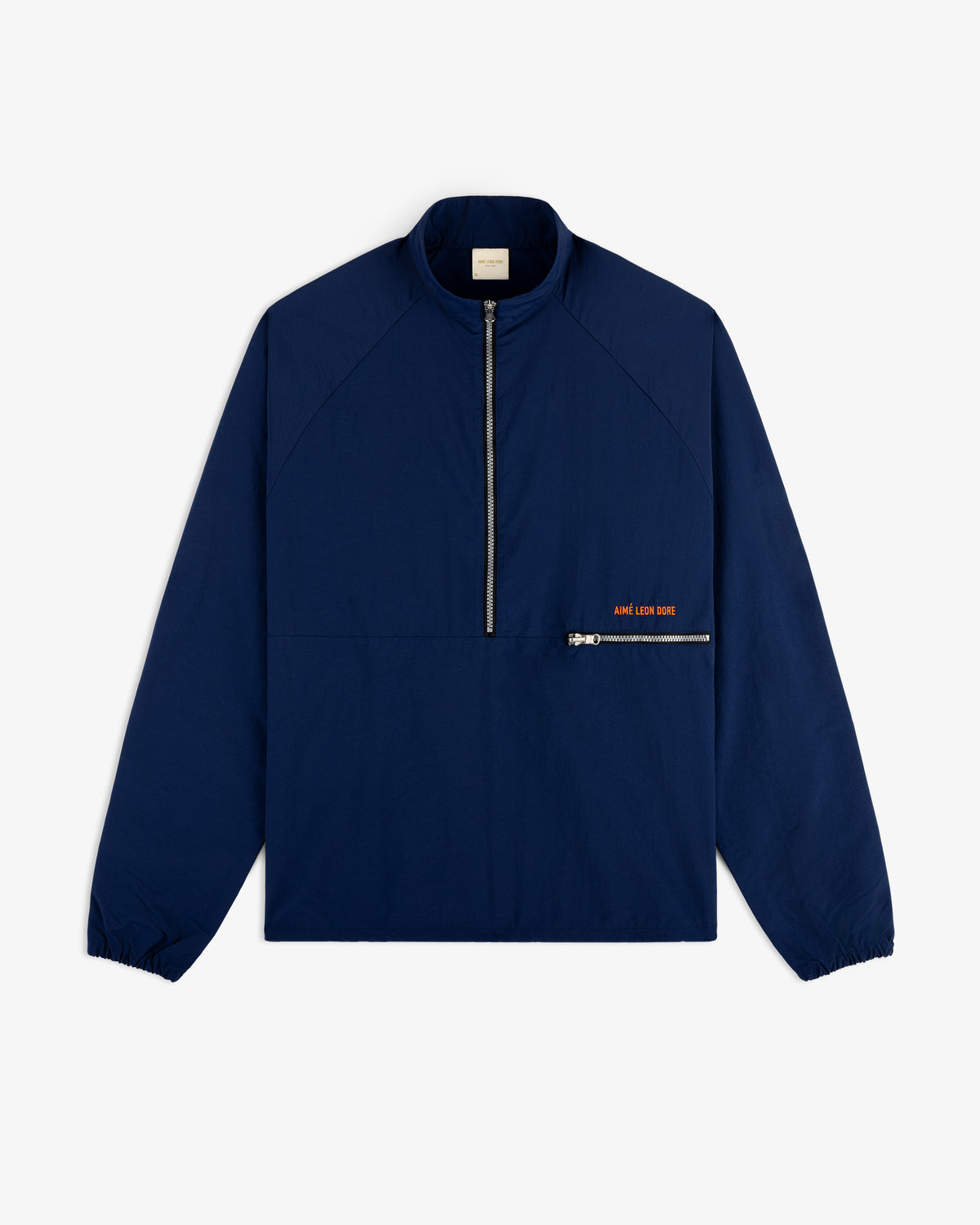Nylon Packable Windbreaker in navy blue with half-zip front, diagonal pocket, and subtle orange text.