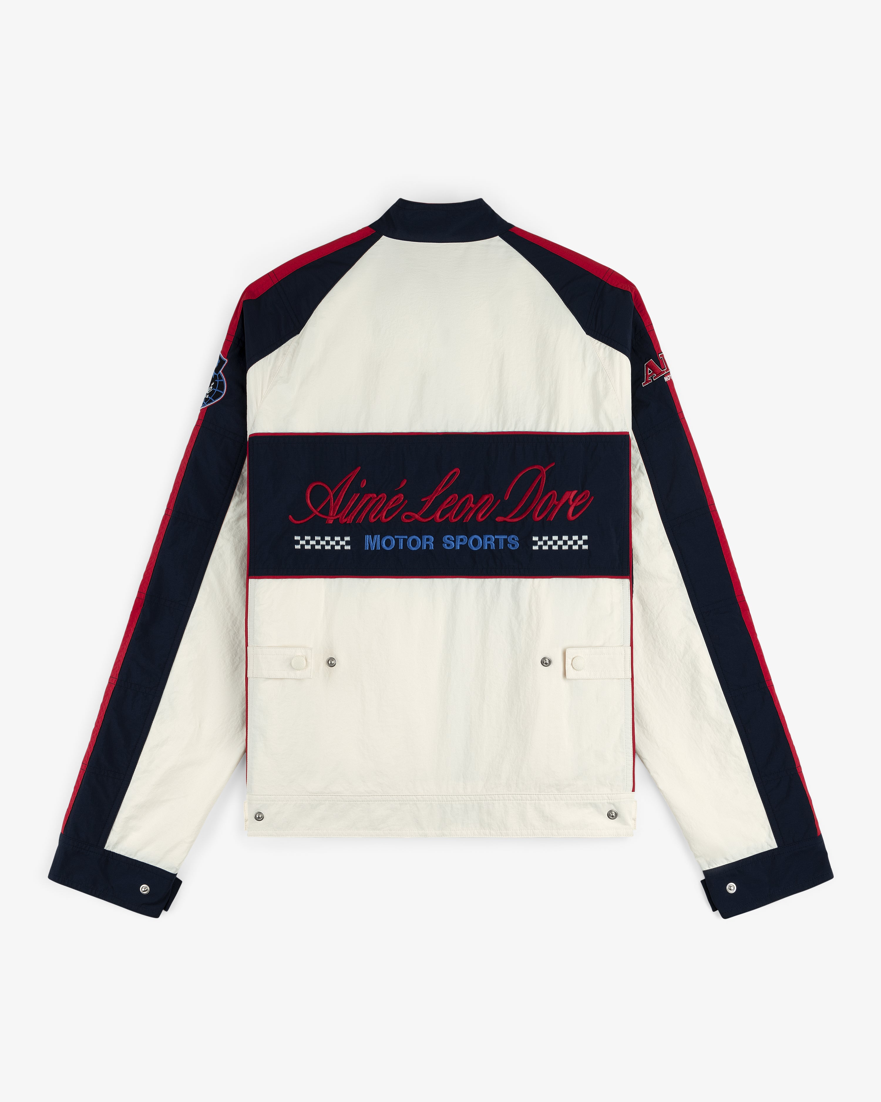 Back view of the Nylon Moto Jacket in white with red/navy accents and Aimé Leon Dore Motor Sports embroidery on back.