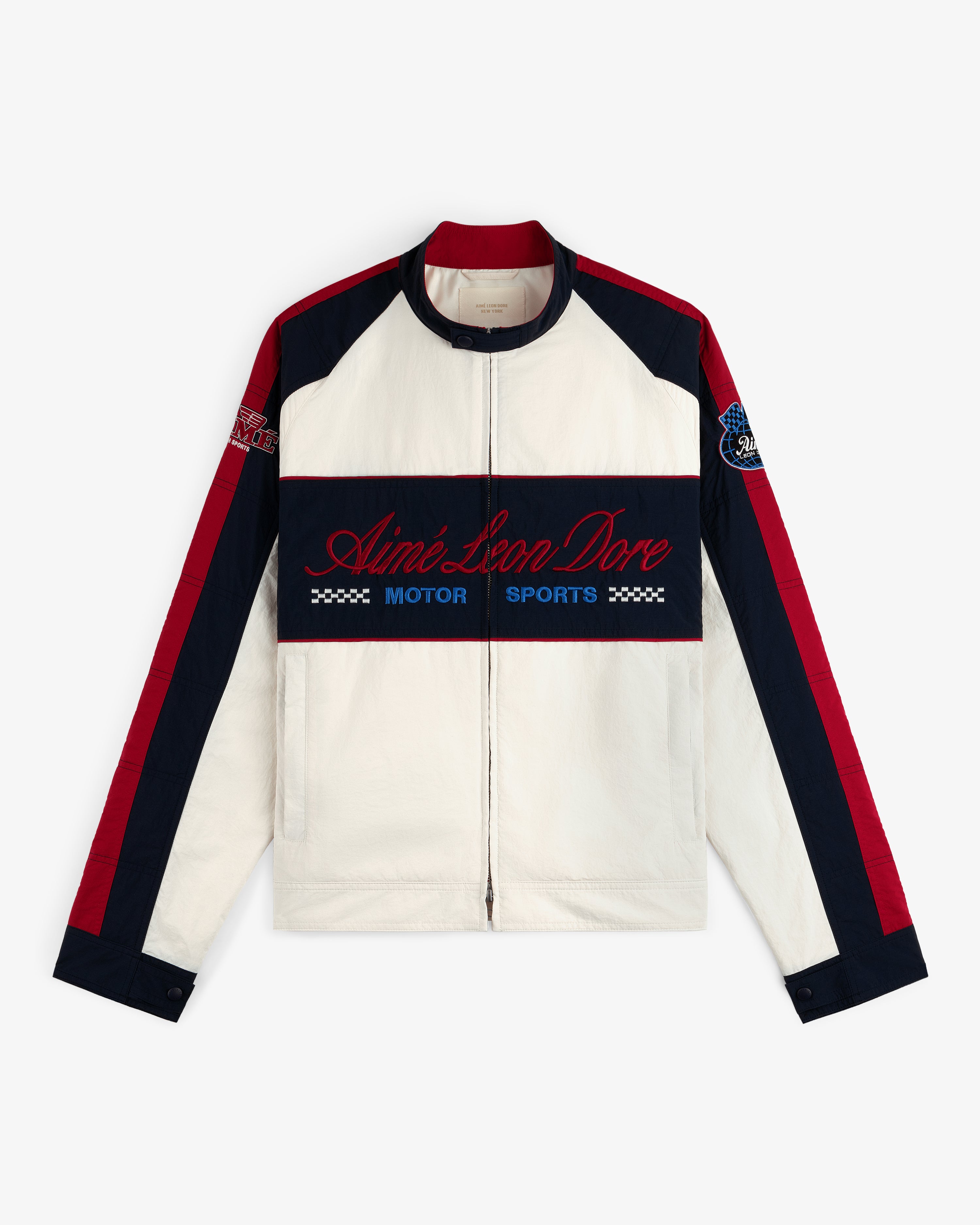 White Nylon Moto Jacket with red and navy stripes, Aimé Leon Dore Motor Sports embroidered on the front.