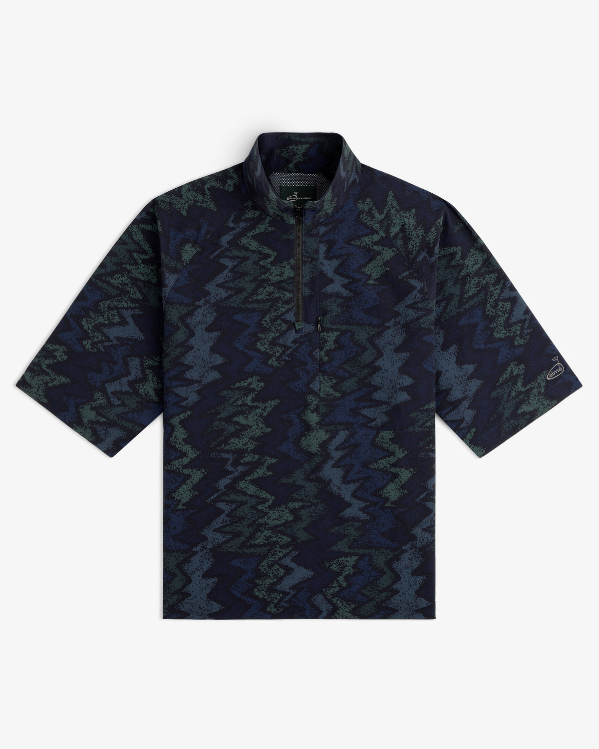 ALD Golf Nylon Quarter Zip Pullover in dark blue and green zigzag pattern, short-sleeve, flat on white background.