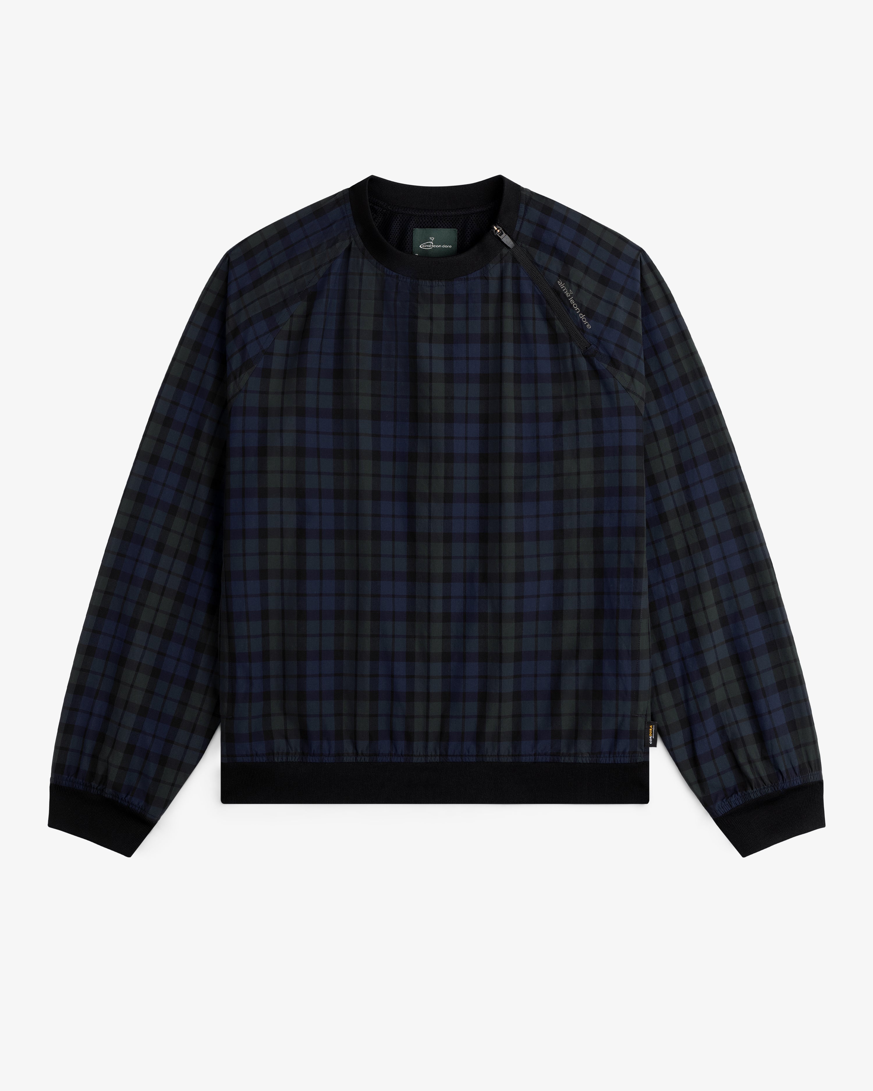 ALD Golf Blackwatch Pullover: navy and black plaid long-sleeve with black cuffs and collar on white background.