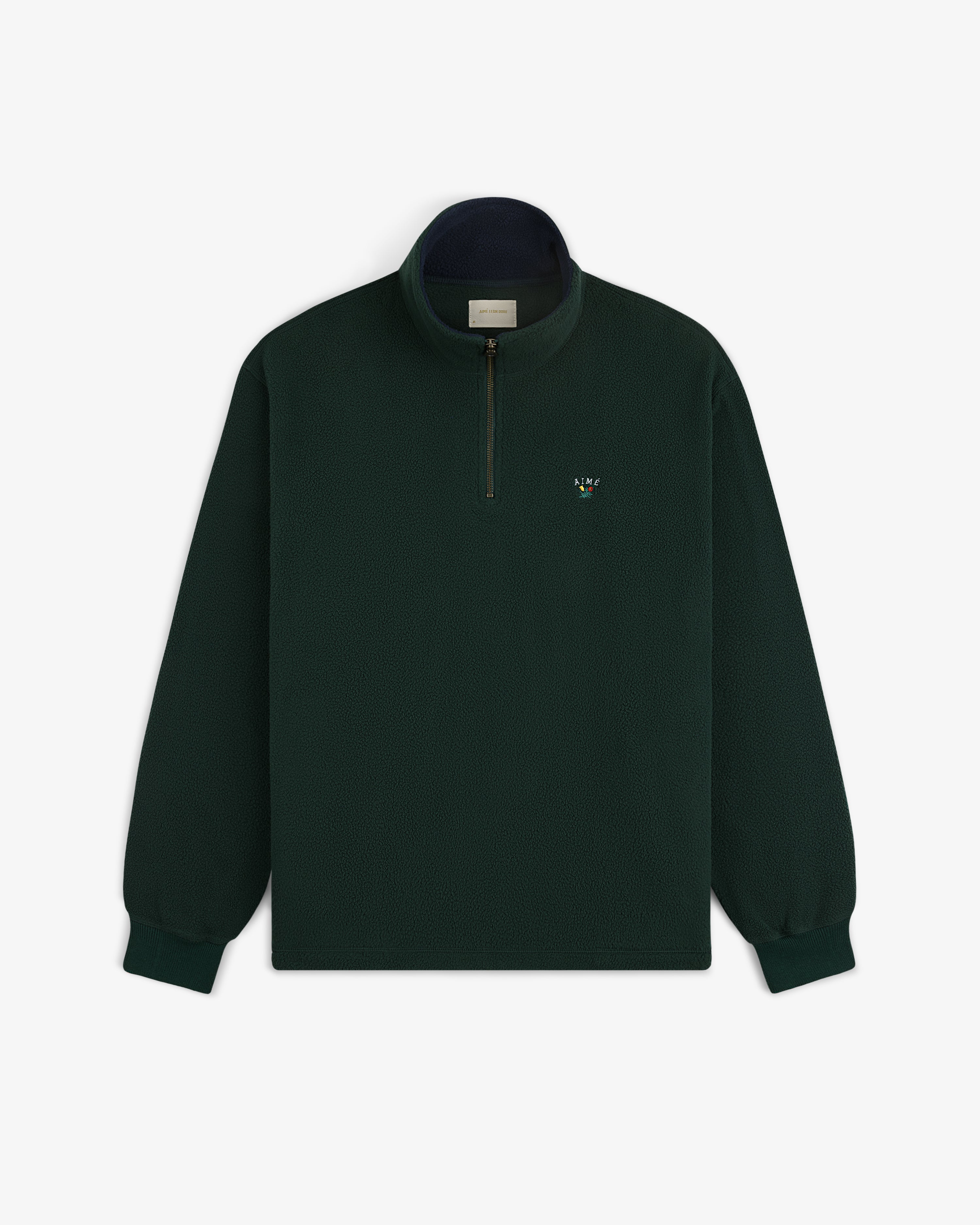 Crest Quarter-Zip Fleece Pullover in dark green with long sleeves and small embroidered chest logo.