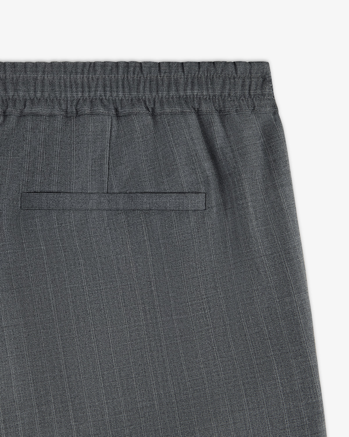 Close-up of Pinstripe Elasticated Waist Trouser in grey, featuring a single back welt pocket.