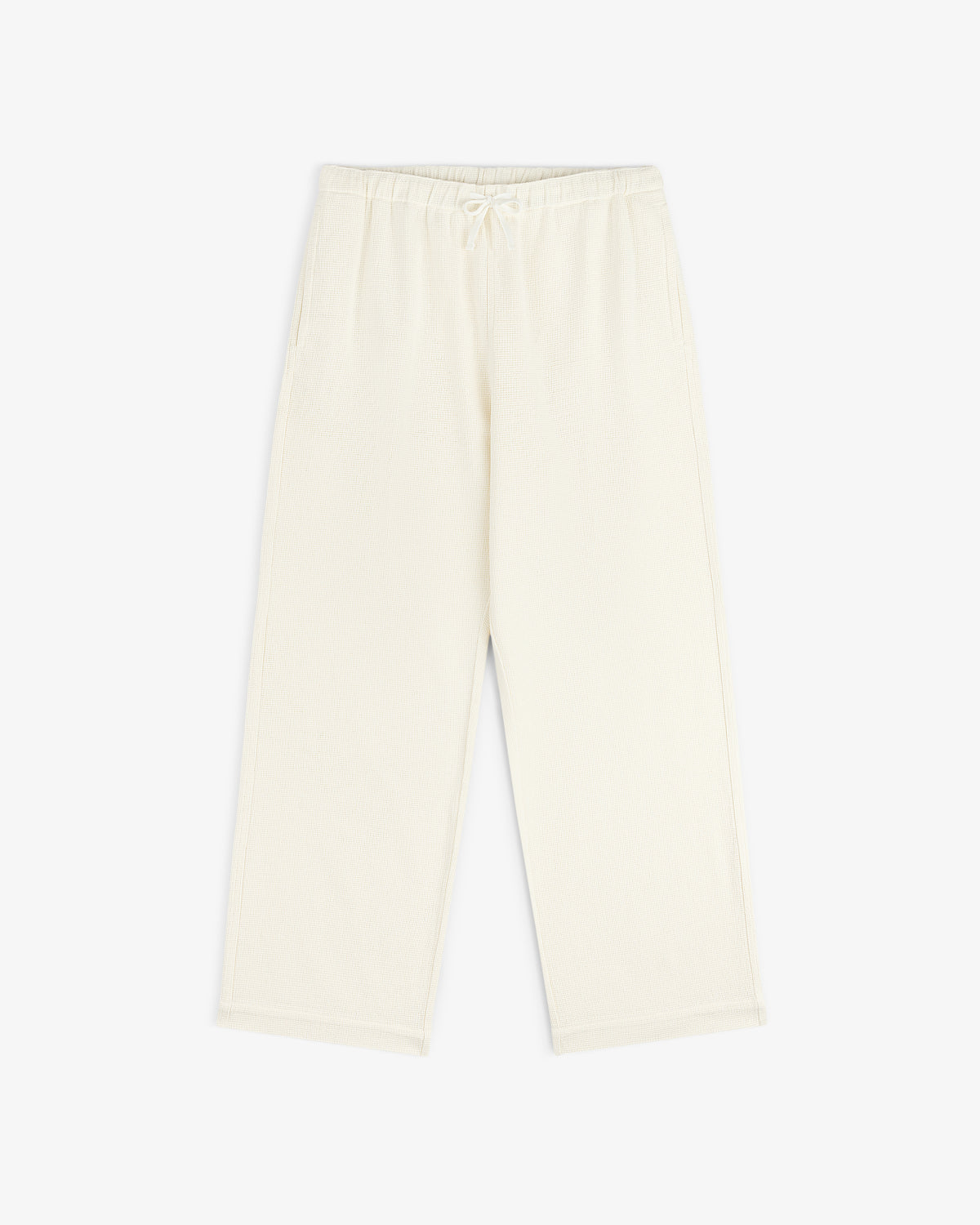 Cream Wide Leg Shore Pant with elastic waistband and side pockets, shown laid flat on a white background.