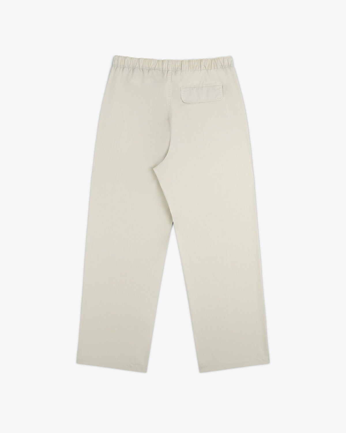 Washed Cotton Windbreaker Pant in beige, straight-leg with elastic waistband and single back pocket, shown flat.