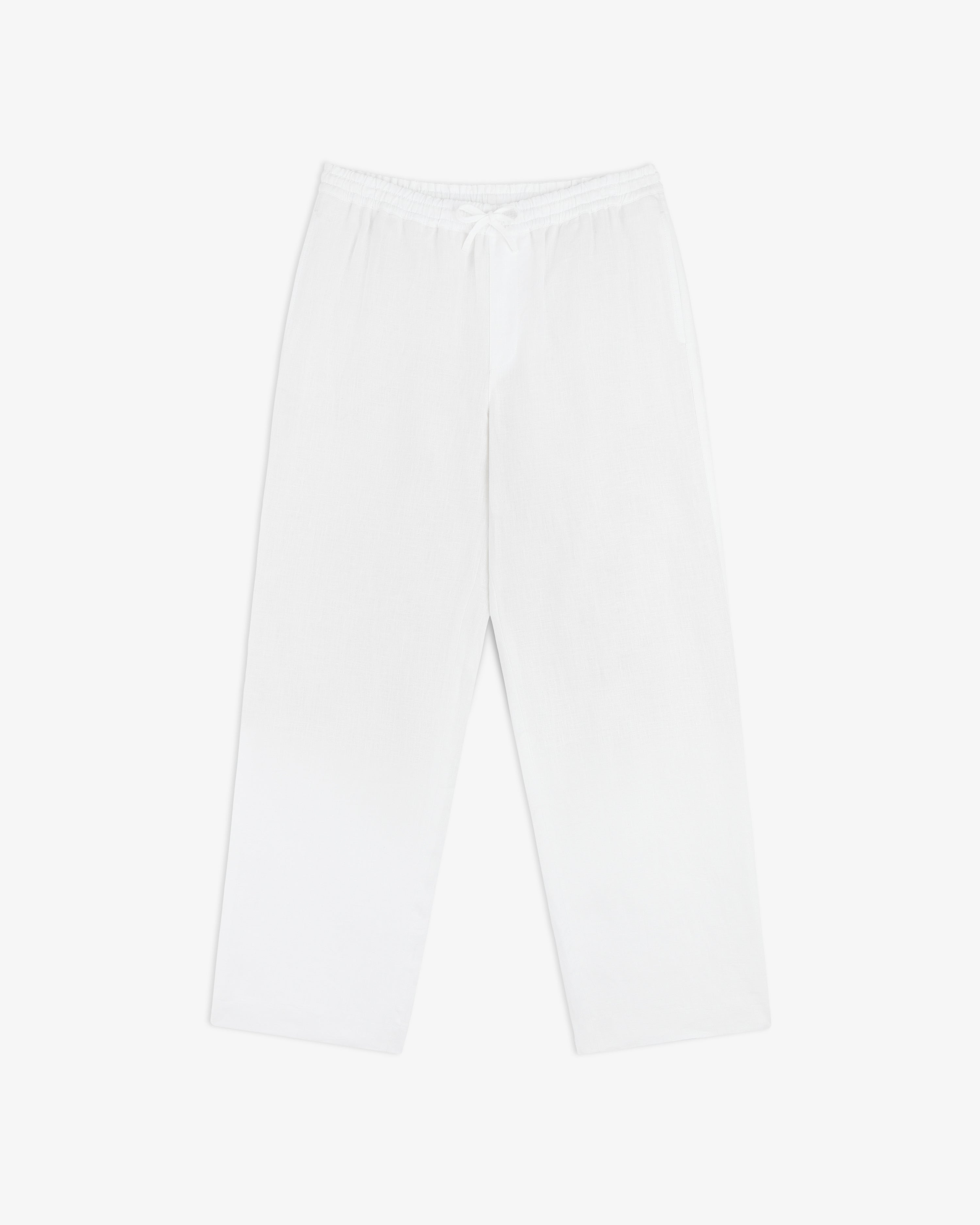 Linen Leisure Pant: white, loose-fitting with elastic waistband and drawstring, shown flat on a white background.