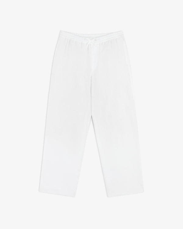 Linen Leisure Pant: white, loose-fitting with elastic waistband and drawstring, shown flat on a white background.