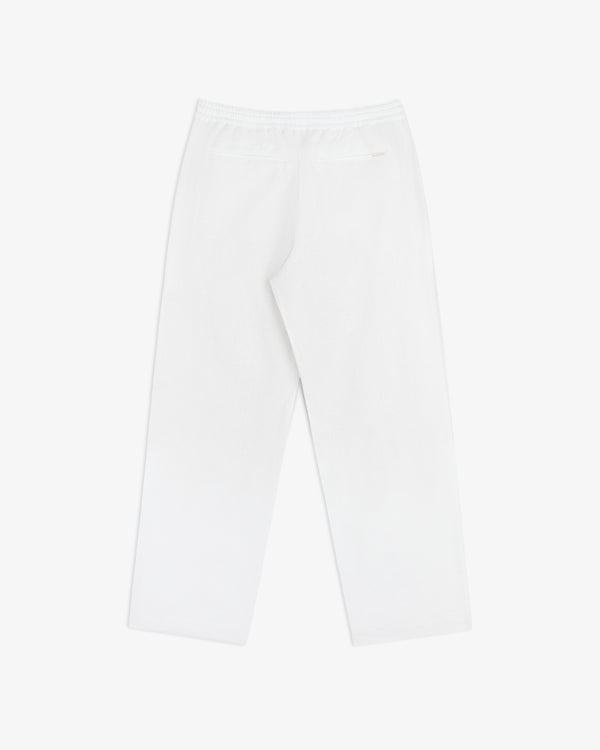 The Linen Leisure Pant features a straight-leg cut, elastic waistband, and back welt pocket, shown on white background.