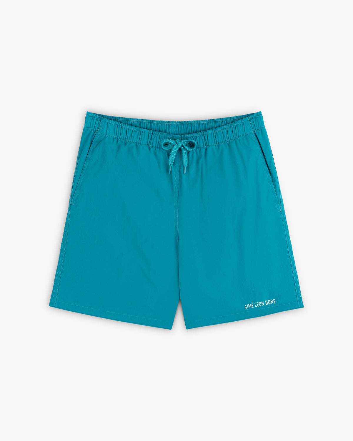 Logo Swim Short in bright turquoise with elastic waistband, drawstring, side pockets, and logo text on the hem.