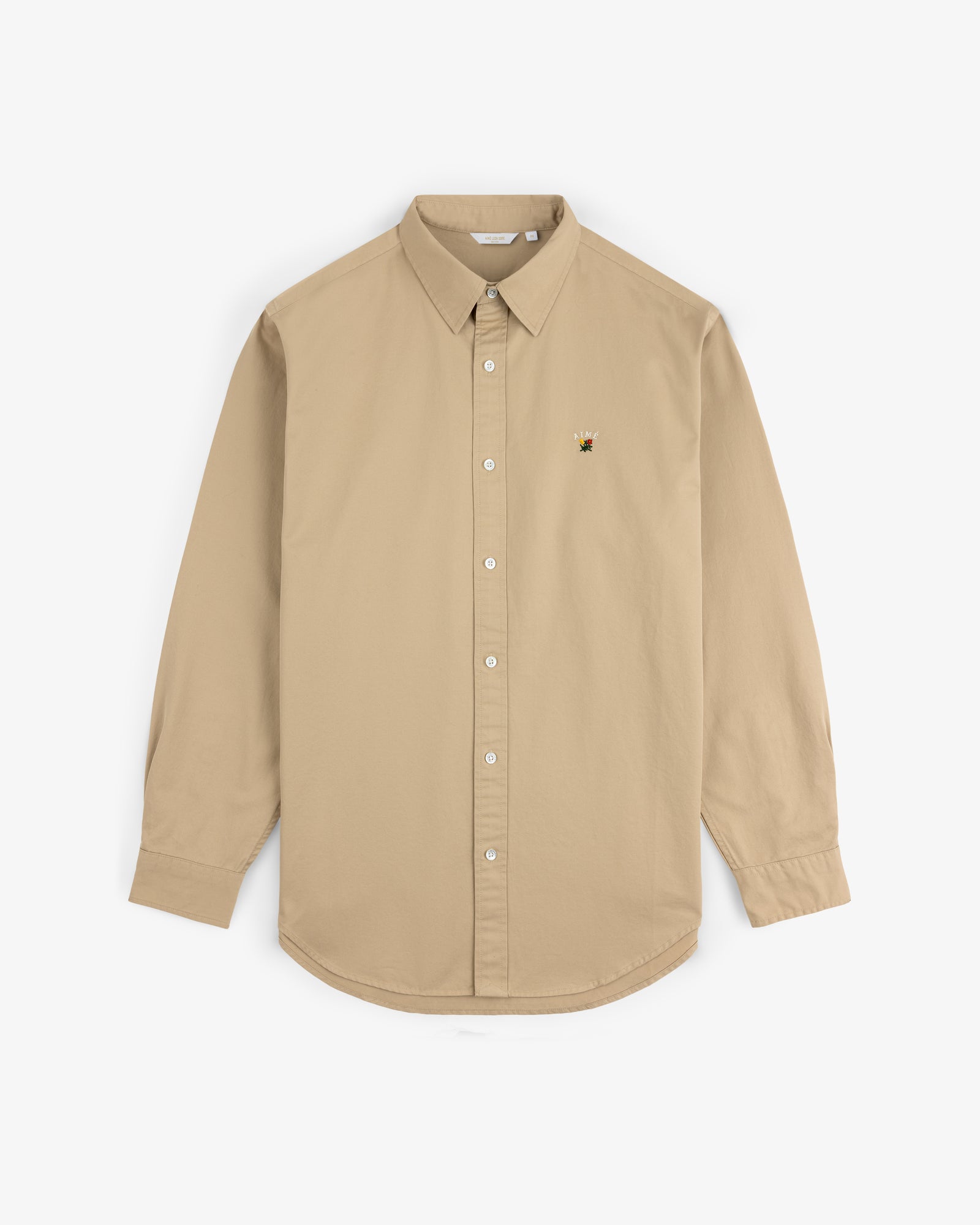 Leon Overshirt in beige, long-sleeve with button-up front and small embroidered bee on left chest, shown on white background.