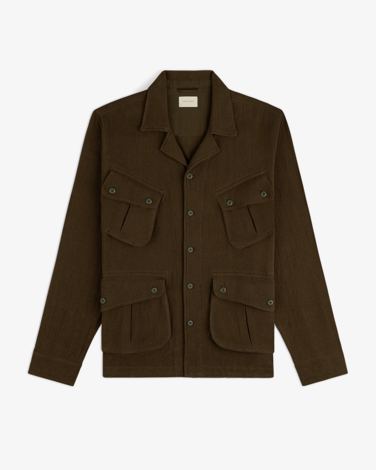 Mesh Jungle Shirt with a collar and four front buttoned flap pockets, laid flat on a white background.