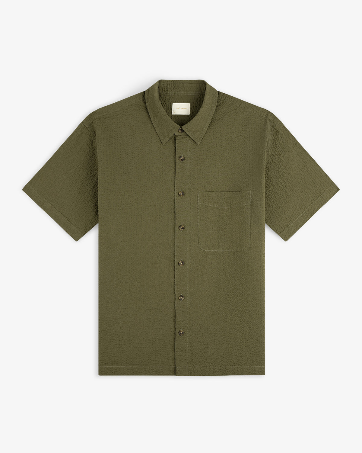 Short-Sleeve Seersucker Shirt in olive green with a chest pocket, laid flat on a white background.