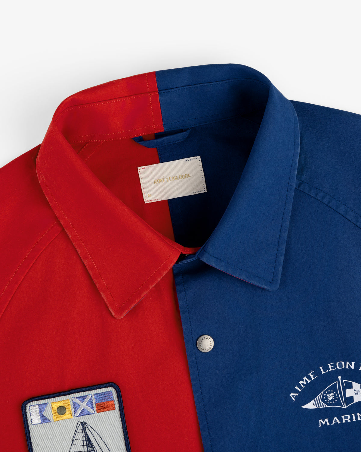 The Marina Jacket features a split red/blue design, nautical patches, and "Aime Leon Dore MARINE" on the blue side.