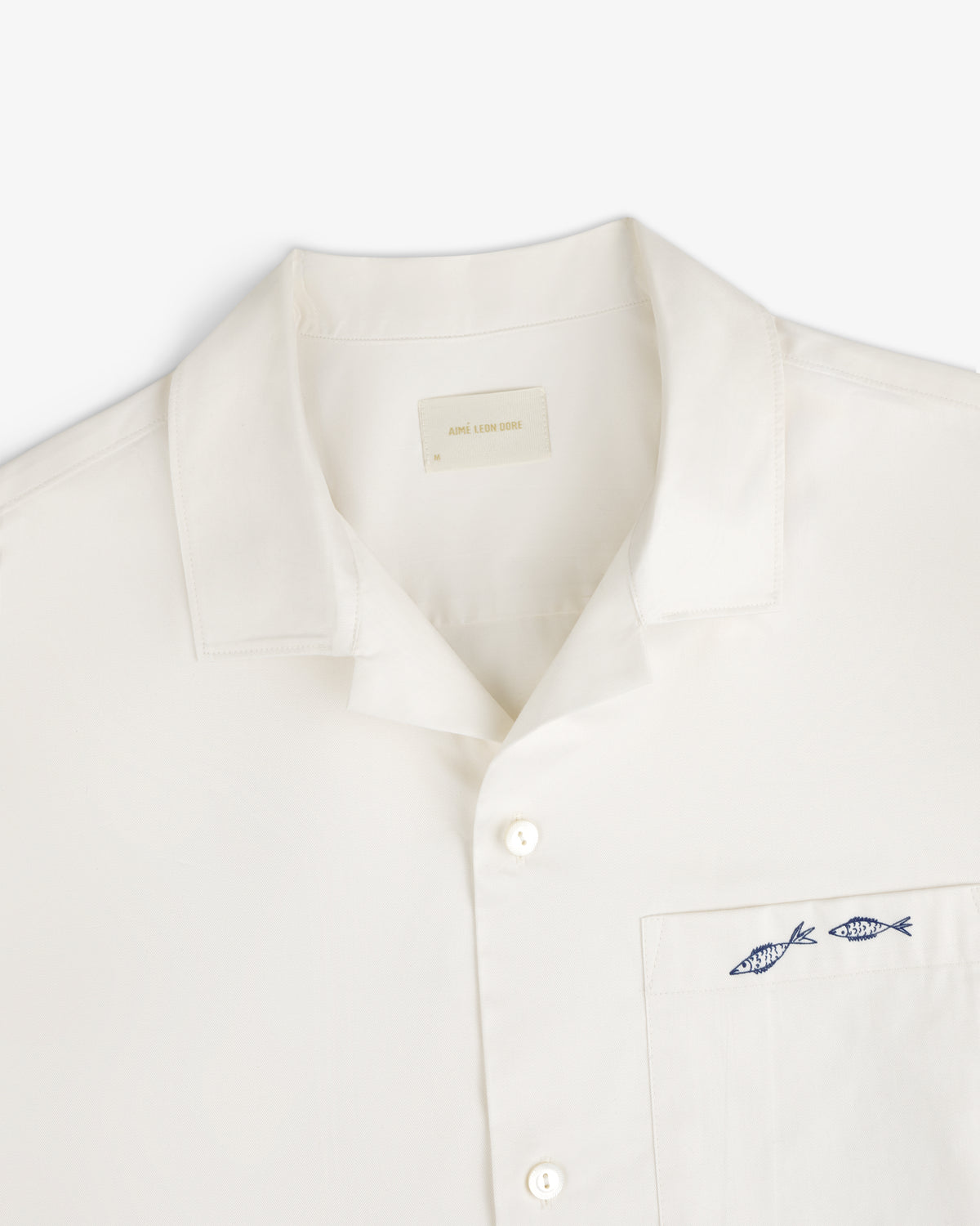 Fassianos "Rendez - Vous" Camp Shirt: White button-up with collar and chest pocket embroidered with two blue fish.