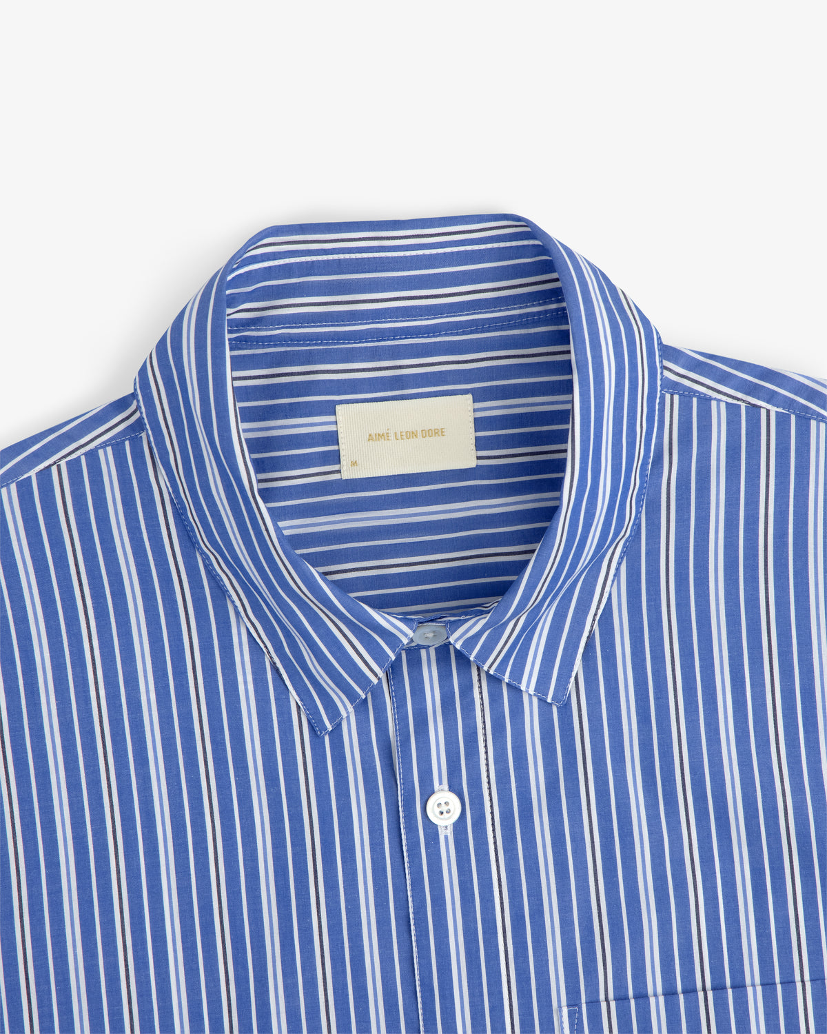 Aimé Leon Dore Yarn Dyed Striped Shirt in blue, spread collar, chest pocket, size M.