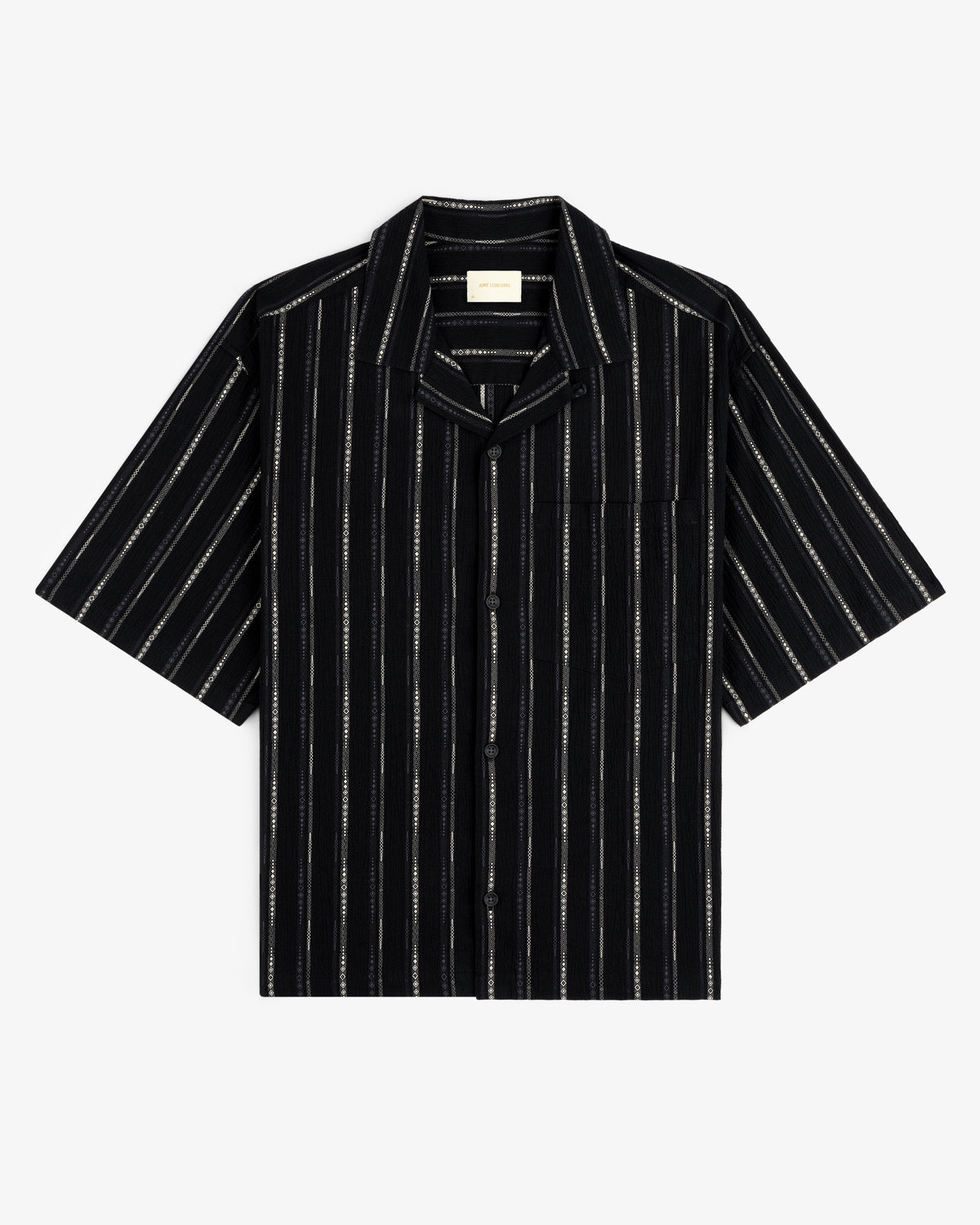 Cropped Jacquard Camp Shirt in black with white vertical stripes, chest pocket, and short sleeves, laid flat.
