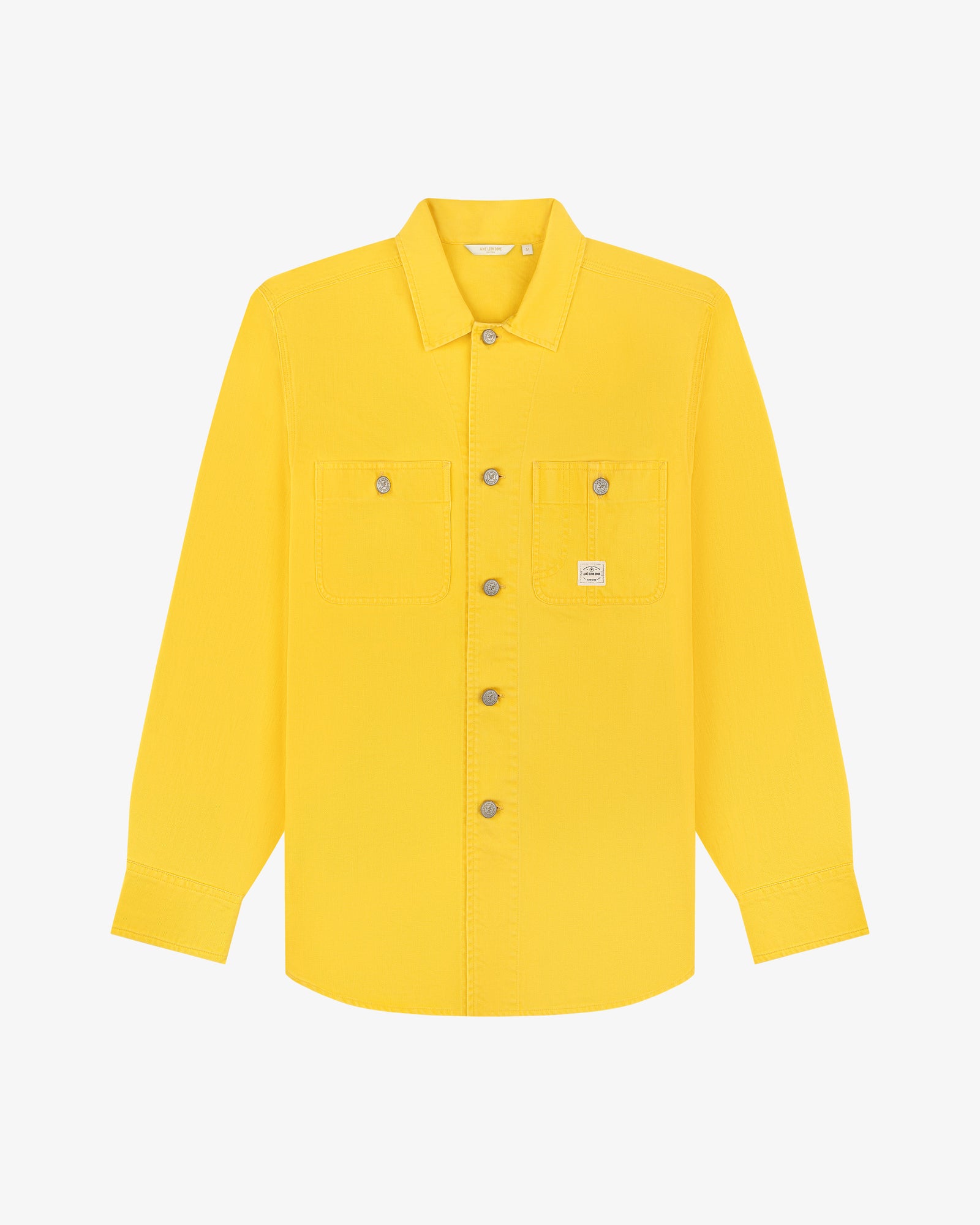 Carpenter Overshirt: bright yellow long-sleeve button-up with two chest pockets, shown on white background.