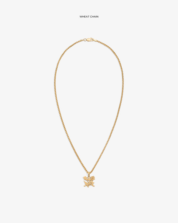14Kt Gold Pendant on wheat chain with bird and branch design, shown against a plain white background.
